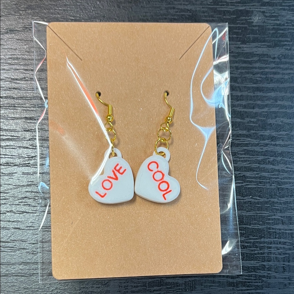 Gold and White Heart Earrings with Red Accents